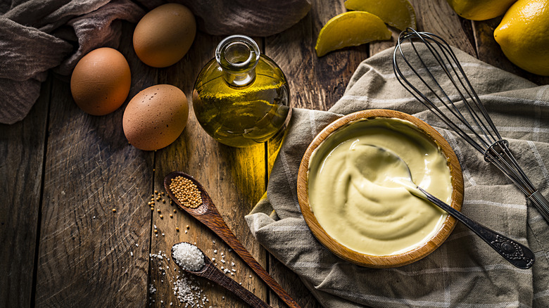 Mayonnaise surrounded by ingredients