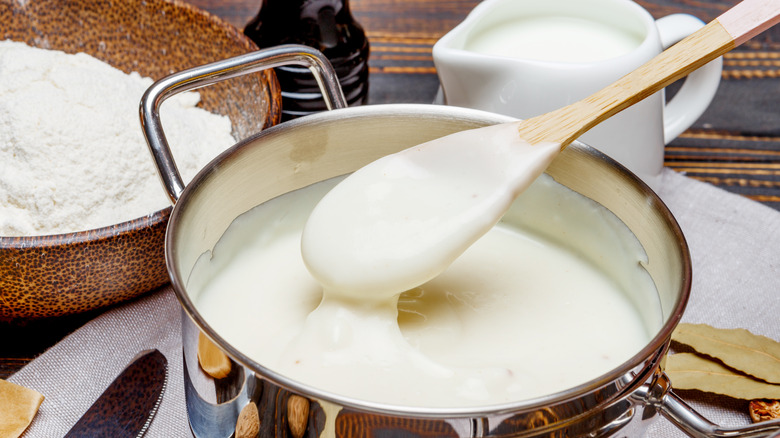 Cream sauce in metal pot 