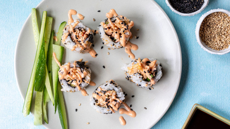 sushi pieces with cucumber slices