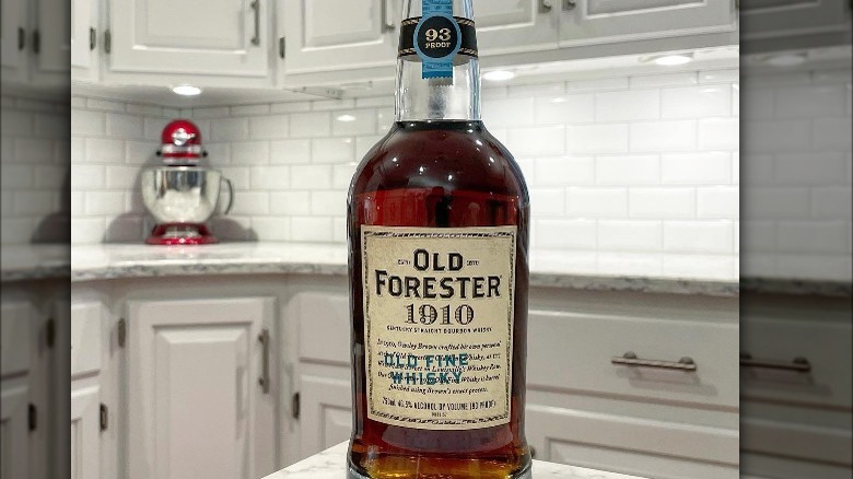 Old Forester 1910 bottle on counter