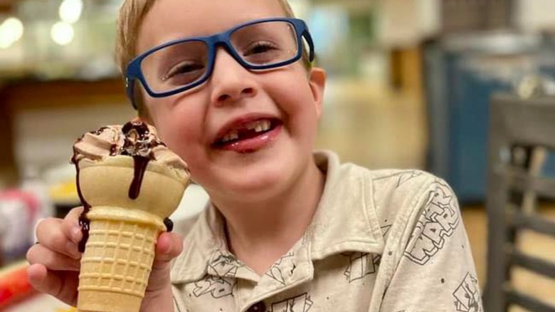 kid with ice cream cone from Grand Country Buffet