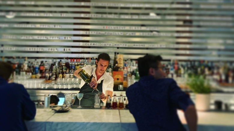 bartender mixing up a cocktail