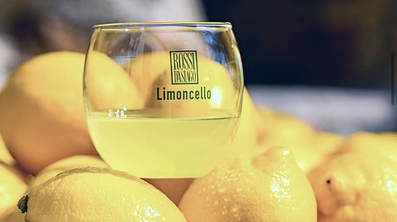 Limoncello glass and lemons