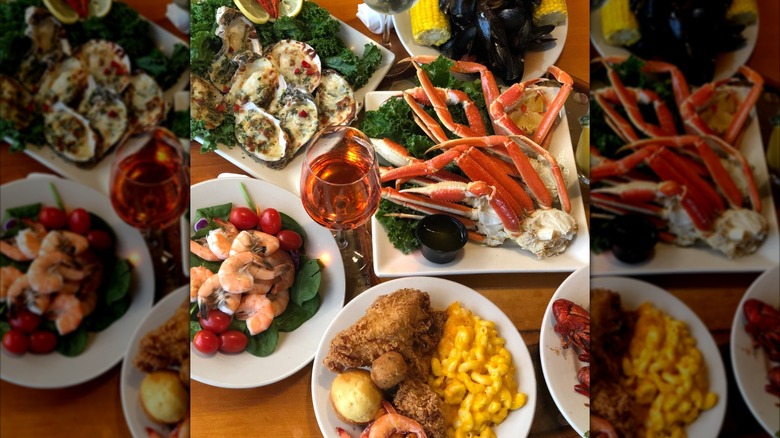 Captain George's table of assorted seafood fishes and wine