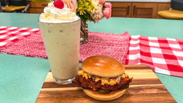 Banana Pudding milkshake with whipped cream and red cherry