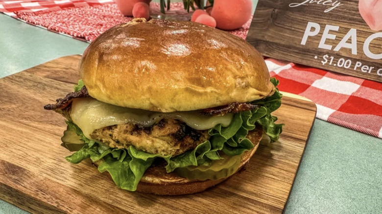 Chick-Fil-A Maple Pepper Bacon Sandwich on a wooden board.