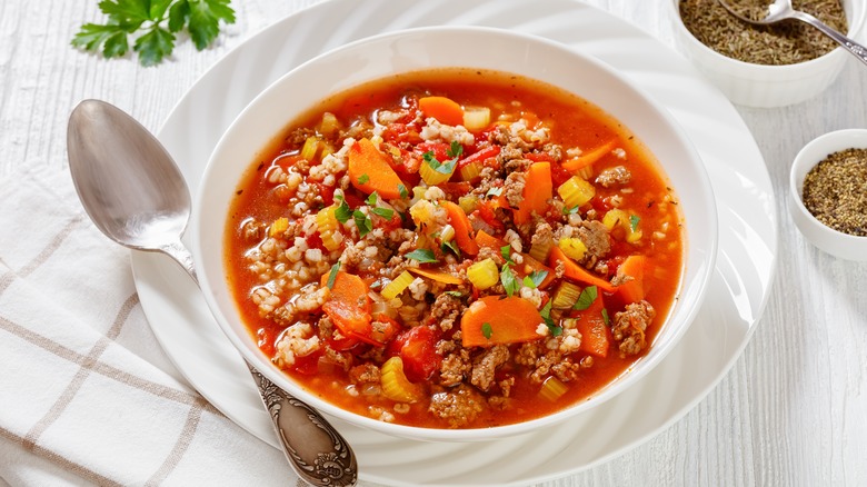 Ground beef soup, white bowl