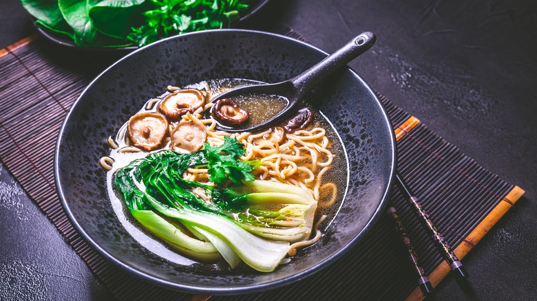 Vegetable ramen in black bowl