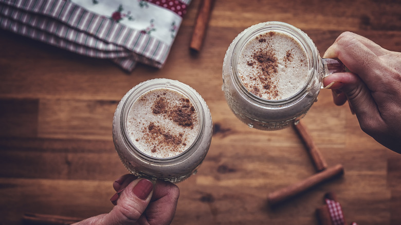 two eggnog glasses