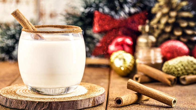 eggnog in glass on wood