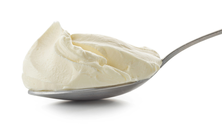 Spoon of cream cheese 