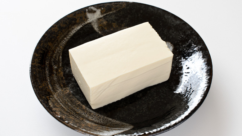 Silken tofu in black bowl