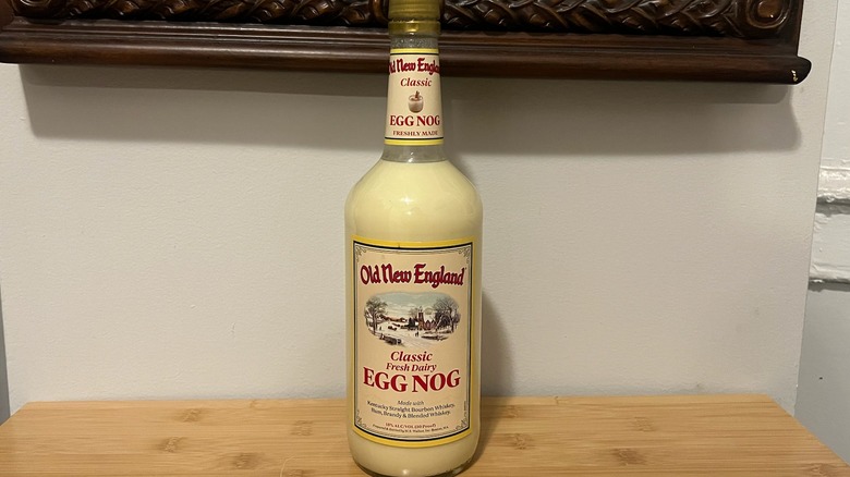 Old New England Classic Egg Nog bottle on table