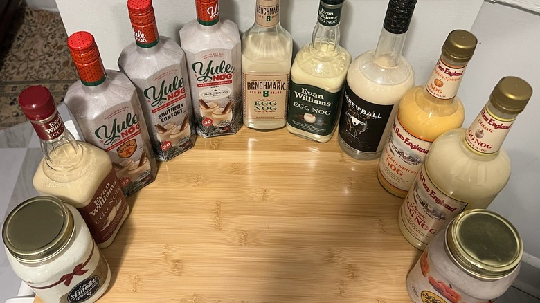 Group of eggnog bottles on table