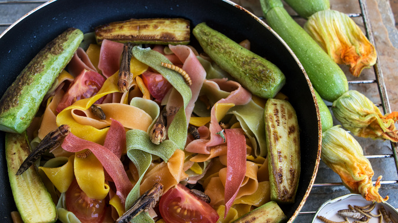 Colorful grilled salad with insects