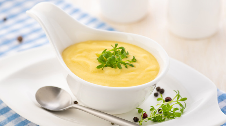 Yellow sauce in white dish