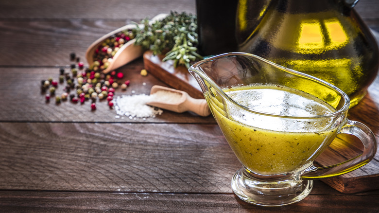 glass boat filled with vinaigrette