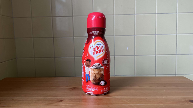 Peppermint Mocha creamer on wooden table