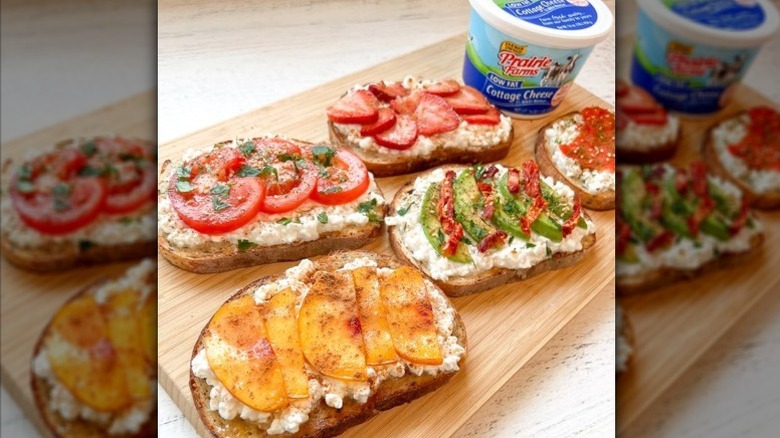 Cottage cheese and various fruits and vegetables on toast