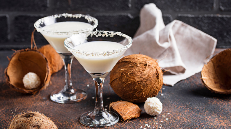 drinks with coconut garnish on rim