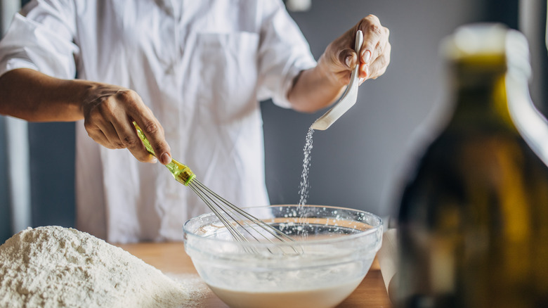 Person whisking baking mix