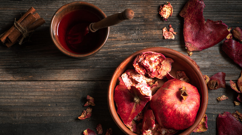 Pomegranate tea in a cup on a table