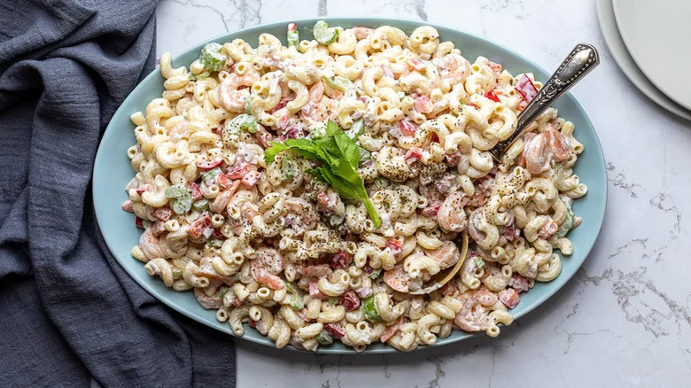 shrimp macaroni salad with spoon