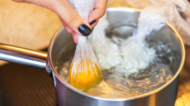 Poaching egg in plastic wrap