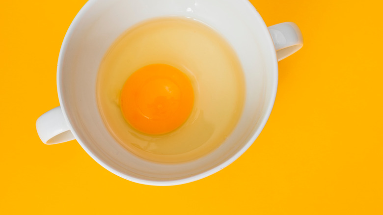 Raw egg in ramekin