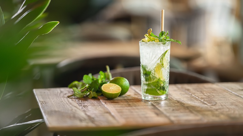 mojito on bench with ingredients