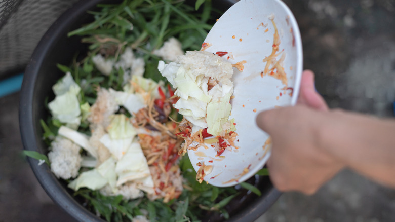 Throwing away food waste