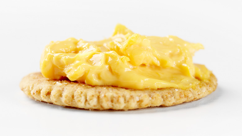 Cheese spread on cracker