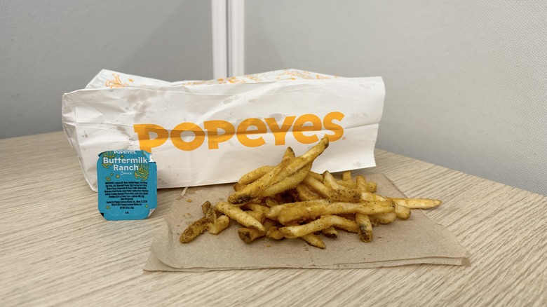 Popeyes' fries and ranch sauce