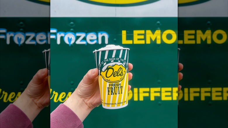 Del's lemonade cup next to truck