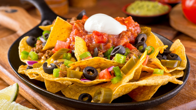 Fully loaded nachos in skillet