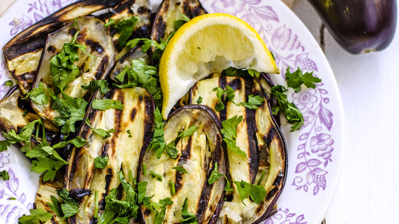 cooked eggplants with lemon and pasrely