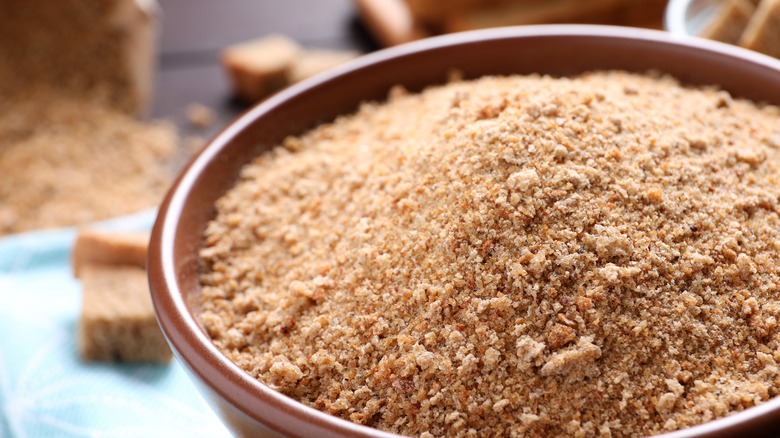 Toasted breadcrumbs in a brown bowl