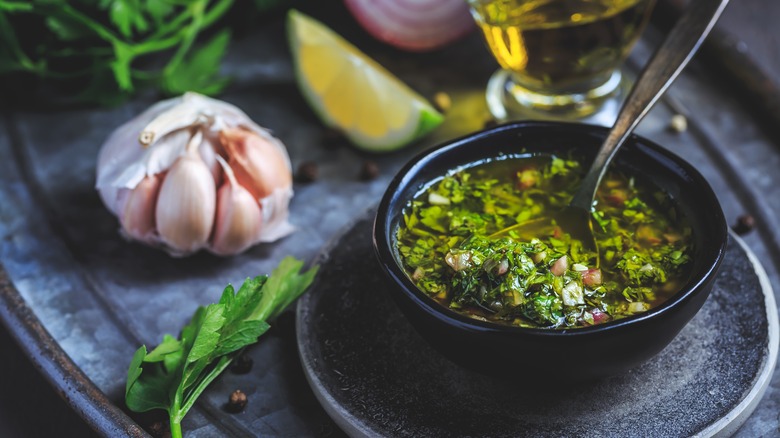 Bowl of chimichurri with garlic