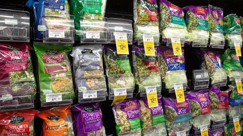 salad kit aisle in a grocery store