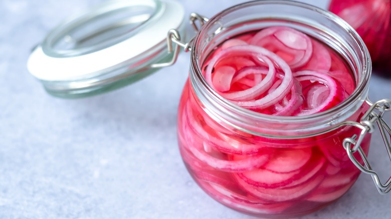 open jar of pickled red onions