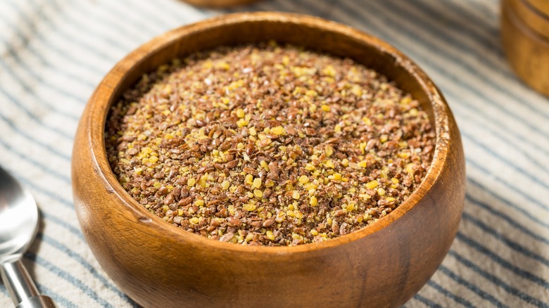 flaxseed in wooden bowl