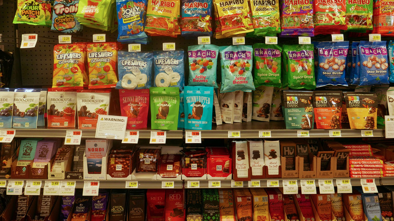 Gelson's candy aisle stocked with gummies and chocolates