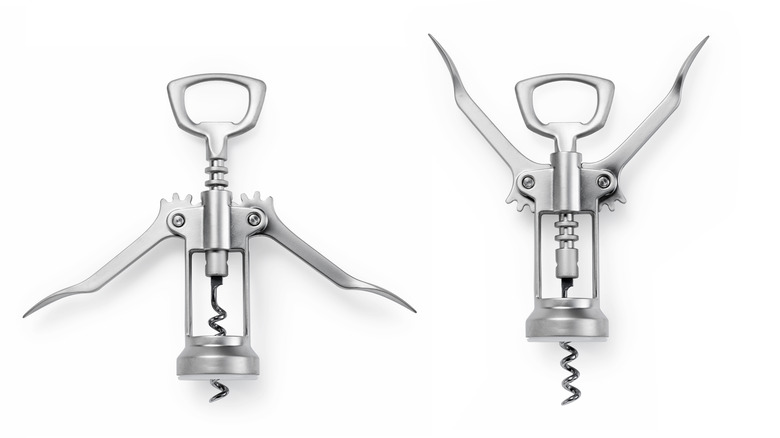 two corkscrews white background 