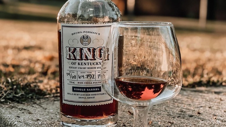 glass and bottle of King of Kentucky bourbon