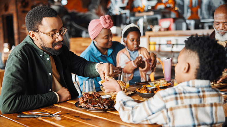 Family with kids at restaurant