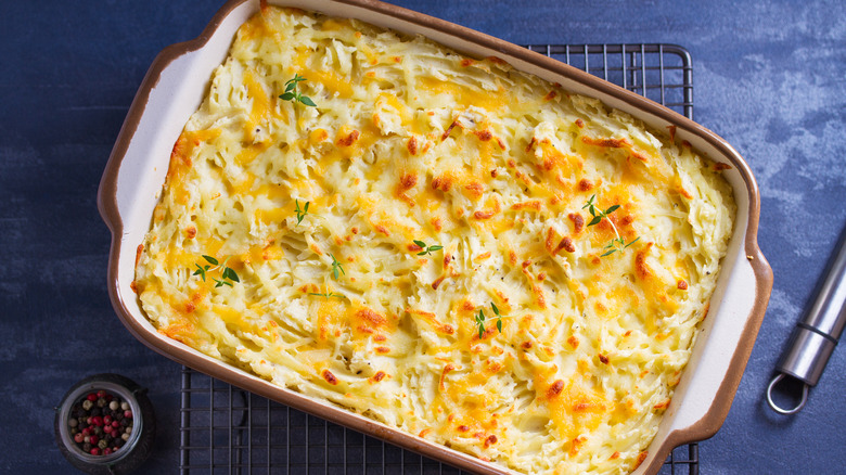 Casserole dish filled with potatoes