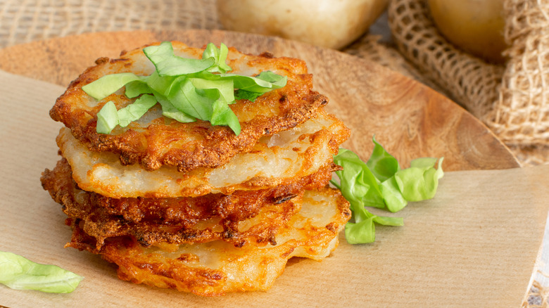 Potato pancakes on brown plate