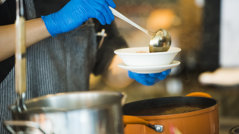 Chef making soup