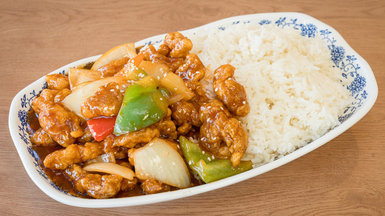 Sweet and sour pork and rice on a plate