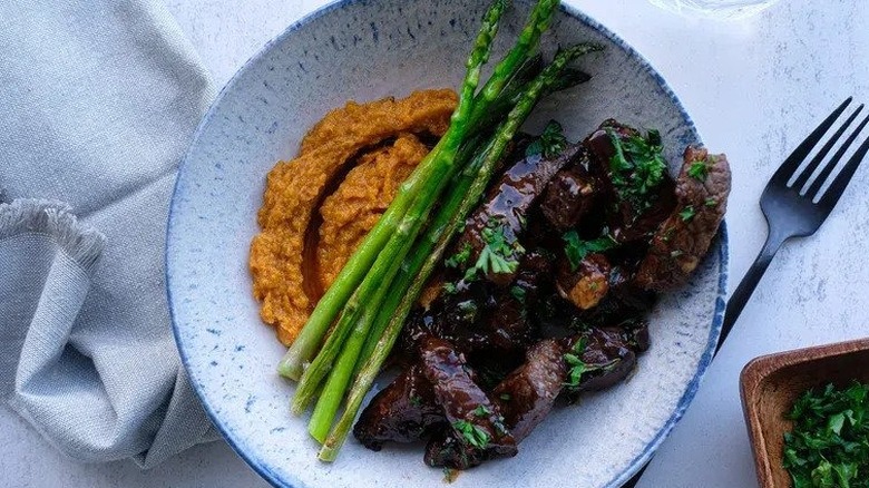 Maple bourbon steak tips plate